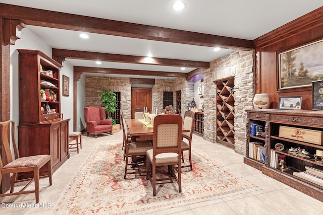 dining space with beam ceiling, light tile patterned floors, and recessed lighting