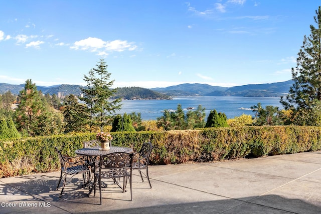 view of mountain feature with a water view