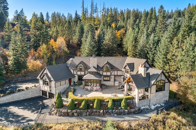 drone / aerial view with a forest view