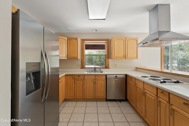 kitchen featuring light tile patterned floors, a sink, light countertops, appliances with stainless steel finishes, and island range hood