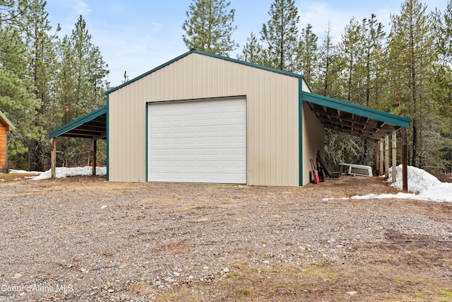 garage with a garage and driveway