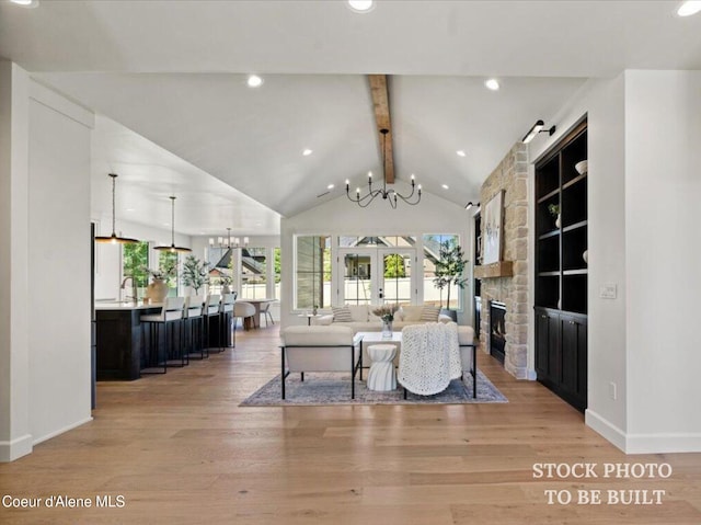 living room featuring french doors, a notable chandelier, beamed ceiling, and light wood finished floors