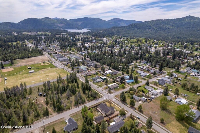 32722 N 10th Ave, Spirit Lake, ID 83869 - aerial overview of property's location with a mountain backdrop and nearby suburban area