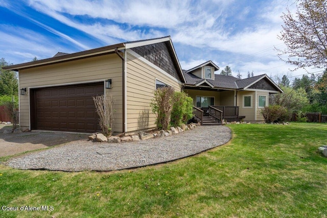 32722 N 10th Ave, Spirit Lake, ID 83869 - view of property exterior featuring an attached garage, a yard, and driveway
