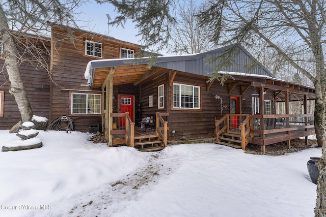 view of front of house featuring a deck and board and batten siding