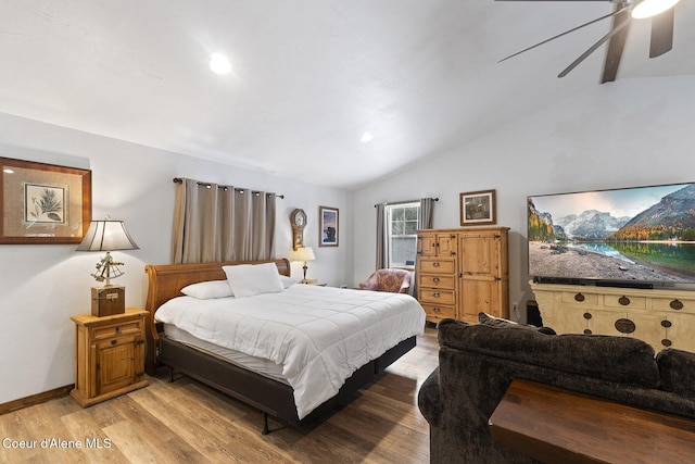 bedroom with baseboards, lofted ceiling, recessed lighting, light wood-style floors, and a ceiling fan