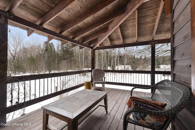 view of snow covered deck