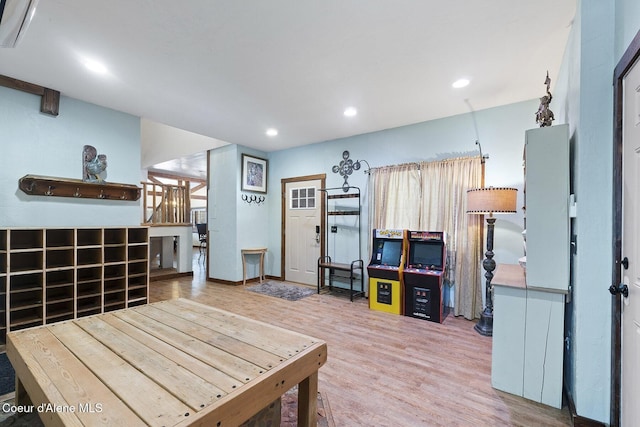 interior space featuring recessed lighting and wood finished floors