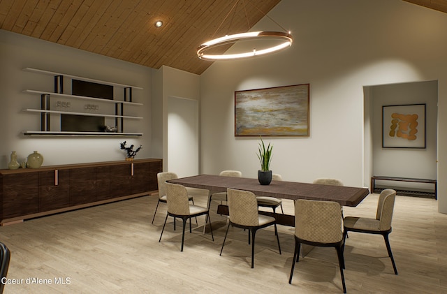 dining area featuring a baseboard heating unit, wood ceiling, light wood-type flooring, and high vaulted ceiling