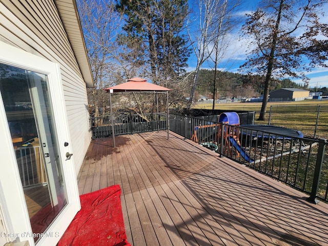 wooden deck with a gazebo