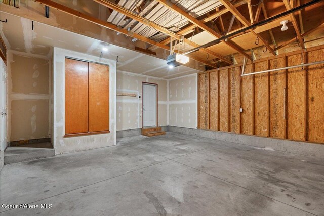 8920 N Torrey Ln, Hayden, ID 83835 - garage featuring a garage door opener