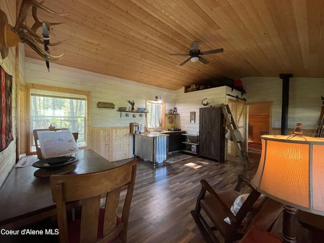 1942 Two Tail Rd, Bonners Ferry, ID 83805 - dining area featuring wooden walls, wood ceiling, a ceiling fan, vaulted ceiling, and dark wood-type flooring