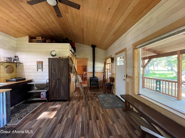 1942 Two Tail Rd, Bonners Ferry, ID 83805 - sunroom featuring a wood stove and vaulted ceiling