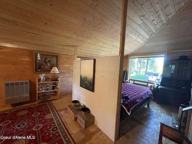 1942 Two Tail Rd, Bonners Ferry, ID 83805 - bedroom featuring heating unit, wooden ceiling, lofted ceiling, and wood walls