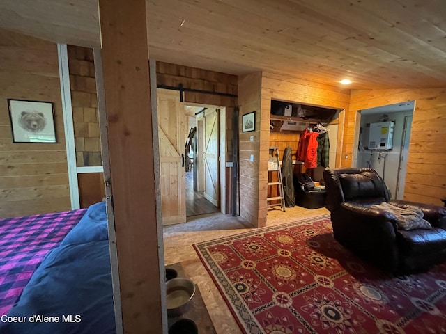 1942 Two Tail Rd, Bonners Ferry, ID 83805 - bedroom featuring wood walls, wood ceiling, a closet, and a spacious closet