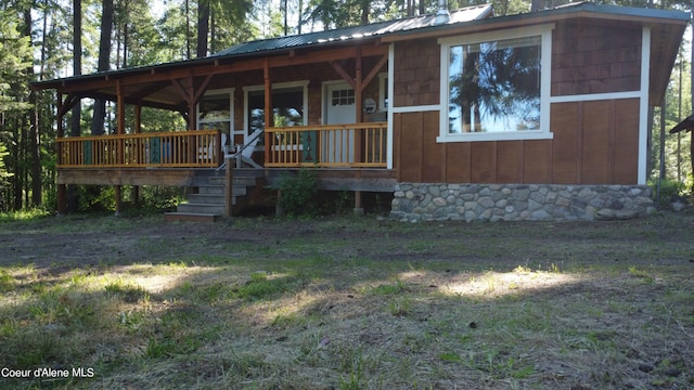1942 Two Tail Rd, Bonners Ferry, ID 83805 - view of front of property with a porch and a metal roof