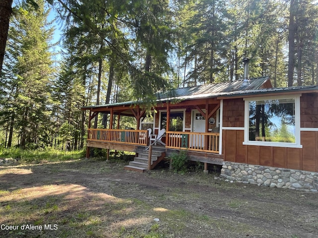 1942 Two Tail Rd, Bonners Ferry, ID 83805 - view of front of home featuring a porch and a metal roof