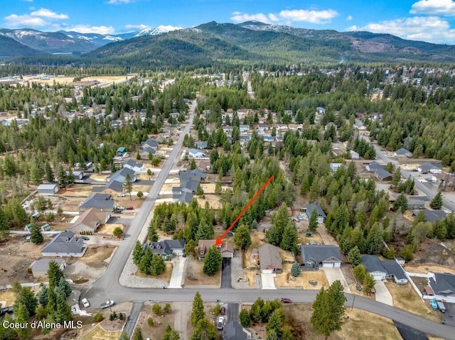 bird's eye view featuring a residential view and a mountain view