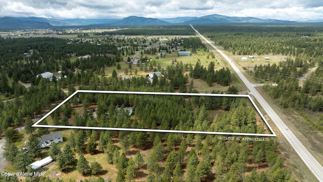 aerial view featuring a mountain view