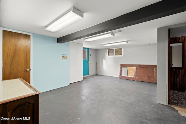 below grade area with concrete block wall