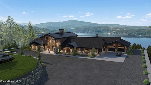 4579 E Plum Rd, Coeur Dalene, ID 83814 - view of front facade featuring stone siding, a garage, concrete driveway, a water and mountain view, and a chimney