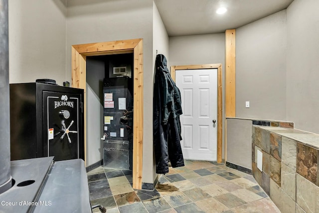 bathroom featuring stone tile floors