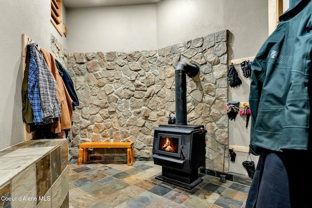 interior details featuring a wood stove