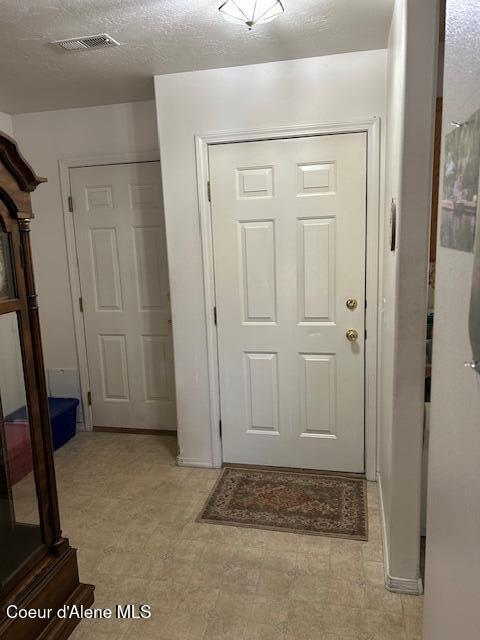 foyer with light flooring