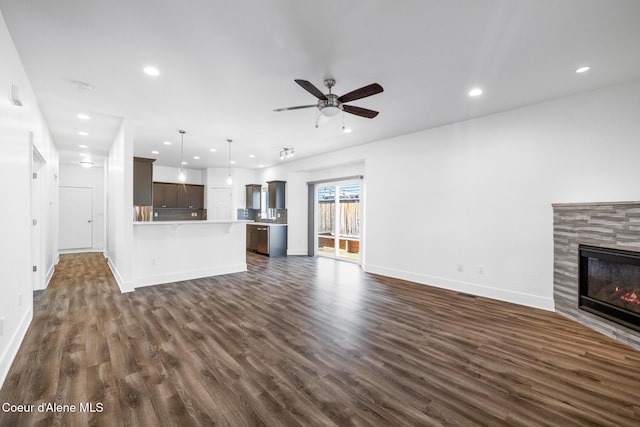 1006 E Garden Ave, Coeur Dalene, ID 83814 - unfurnished living room with baseboards, a ceiling fan, dark wood-style floors, and recessed lighting