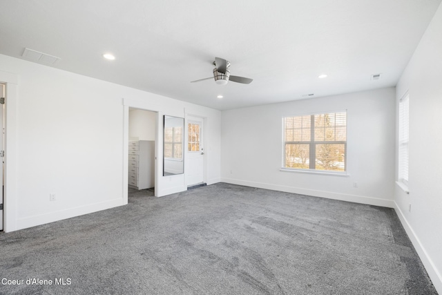 1006 E Garden Ave, Coeur Dalene, ID 83814 - unfurnished bedroom with visible vents, carpet flooring, and multiple windows