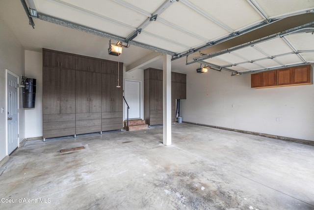 1006 E Garden Ave, Coeur Dalene, ID 83814 - garage with a garage door opener and baseboards