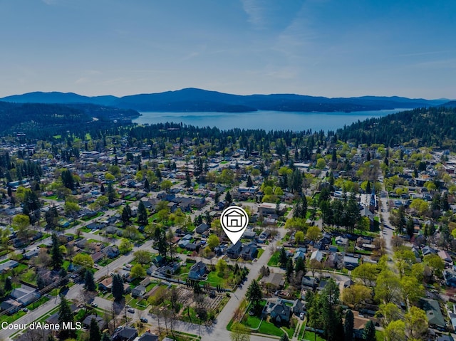 1006 E Garden Ave, Coeur Dalene, ID 83814 - birds eye view of property with a water and mountain view and a view of trees