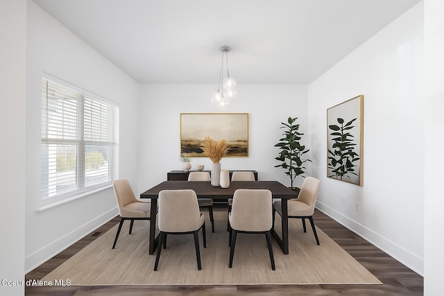 1006 E Garden Ave, Coeur Dalene, ID 83814 - dining space featuring dark wood finished floors