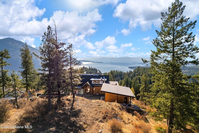 property view of mountains featuring a water view