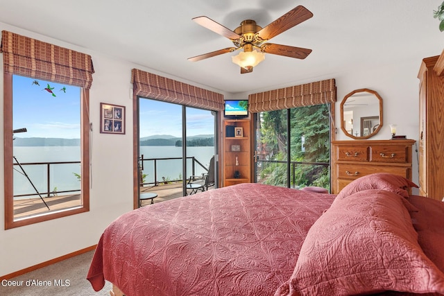 190 W Eagle Crest Dr, Coeur Dalene, ID 83814 - bedroom with baseboards, carpet, ceiling fan, and access to outside