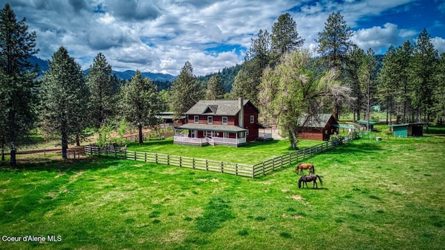 415 Shale Rd, Priest River, ID 83856 - view of yard with a forest view, an outdoor structure, and a view of countryside