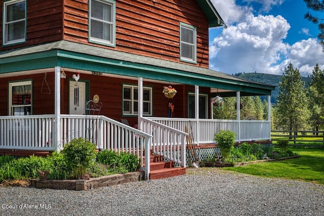 415 Shale Rd, Priest River, ID 83856 - view of front of house with a porch