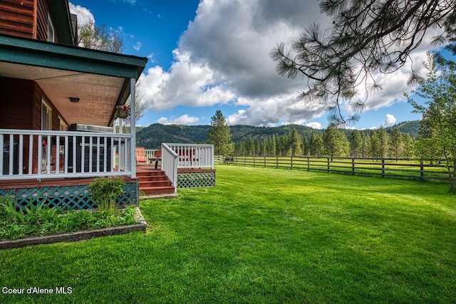 415 Shale Rd, Priest River, ID 83856 - view of yard featuring a deck with mountain view and a view of countryside