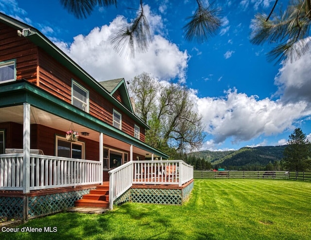 415 Shale Rd, Priest River, ID 83856 - view of yard with a mountain view and covered porch