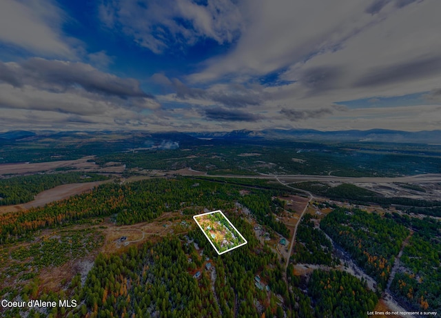 aerial view featuring a mountain view