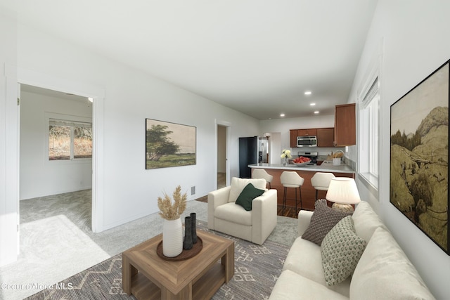 carpeted living room featuring recessed lighting