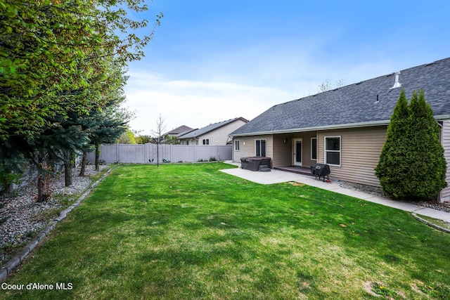 7068 N Epervier Ln, Coeur Dalene, ID 83815 - view of yard with a patio and a hot tub