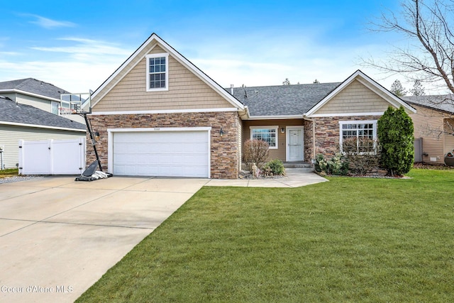 7068 N Epervier Ln, Coeur Dalene, ID 83815 - view of front of property with stone siding, concrete driveway, and a gate