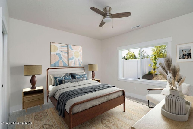 7365 N Breaux, Coeur Dalene, ID 83815 - bedroom featuring baseboards and a ceiling fan