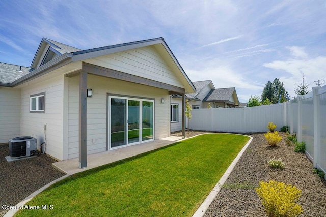7365 N Breaux, Coeur Dalene, ID 83815 - rear view of property with cooling unit and roof with shingles