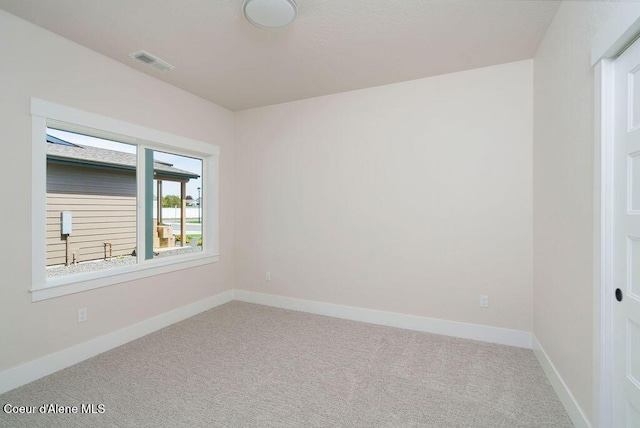 7365 N Breaux, Coeur Dalene, ID 83815 - carpeted empty room featuring baseboards
