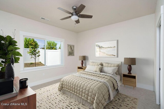 7279 N Grafton St, Coeur Dalene, ID 83815 - carpeted bedroom with baseboards and a ceiling fan