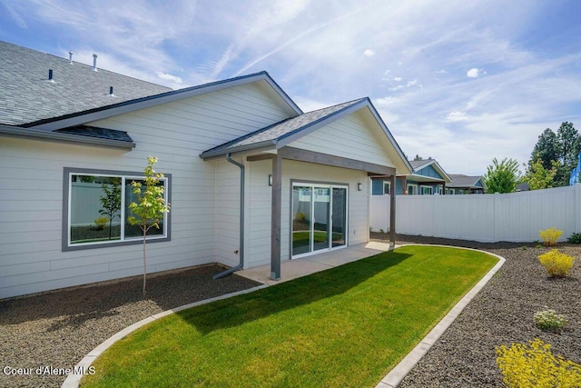 7279 N Grafton St, Coeur Dalene, ID 83815 - back of property featuring a shingled roof