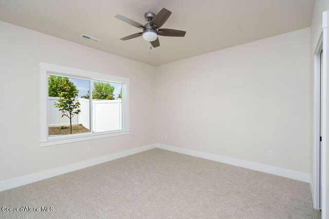 7279 N Grafton St, Coeur Dalene, ID 83815 - carpeted spare room featuring a ceiling fan and baseboards