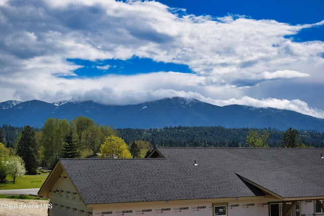 property view of mountains with a forest view